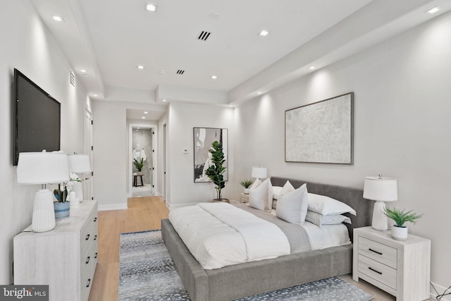 bedroom featuring light hardwood / wood-style flooring