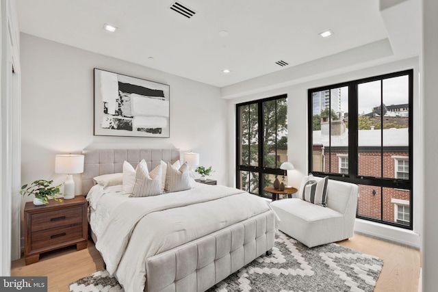 bedroom with light wood-type flooring