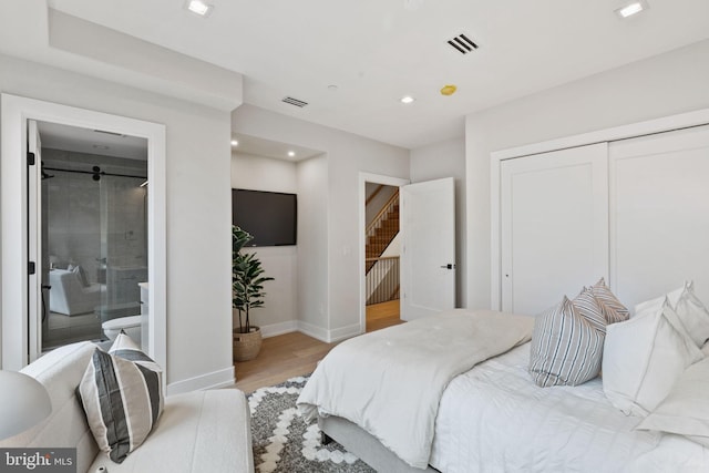 bedroom featuring light hardwood / wood-style floors