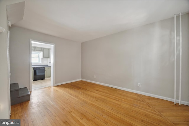 unfurnished living room featuring light wood-type flooring