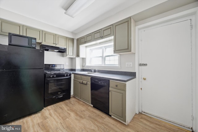 kitchen with light hardwood / wood-style flooring, black appliances, sink, and gray cabinetry