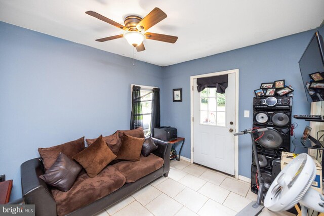 living room featuring ceiling fan