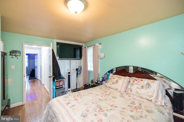 bedroom featuring hardwood / wood-style flooring