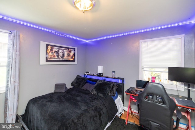 bedroom featuring hardwood / wood-style floors