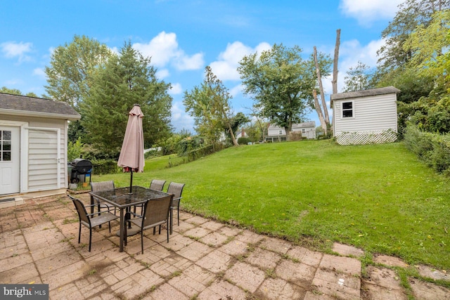 view of patio with a shed