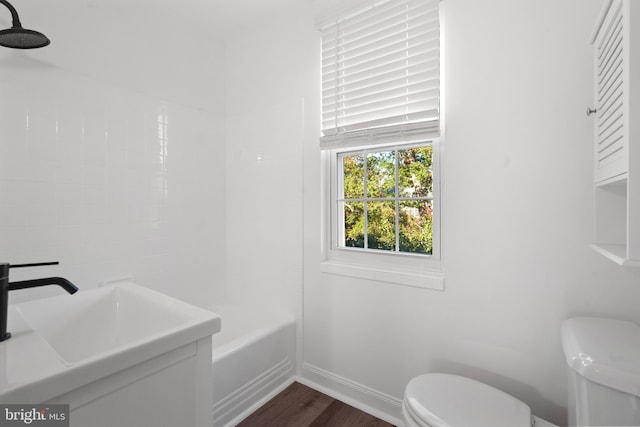 full bathroom featuring vanity, toilet, shower / bathing tub combination, and hardwood / wood-style floors