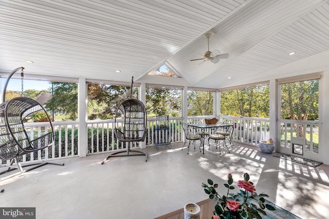 sunroom / solarium with vaulted ceiling and ceiling fan