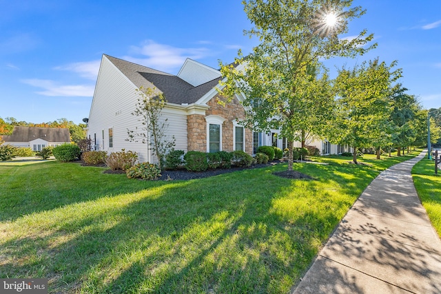 view of front of home with a front lawn