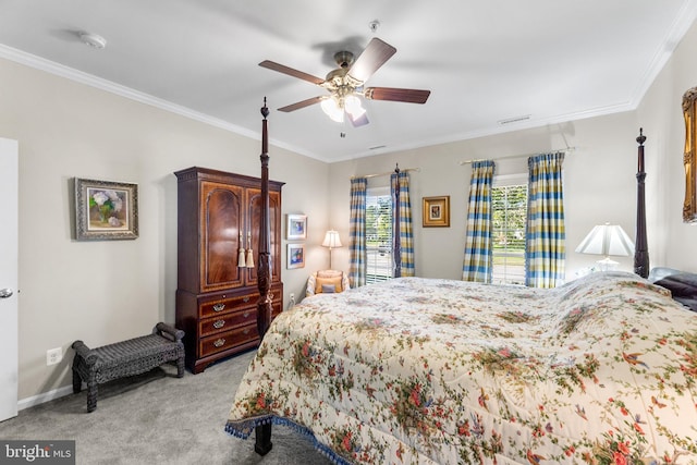 carpeted bedroom with ornamental molding and ceiling fan