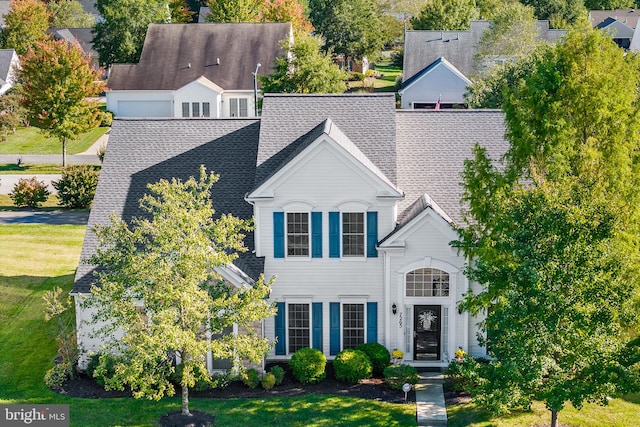 view of front of property with a front lawn