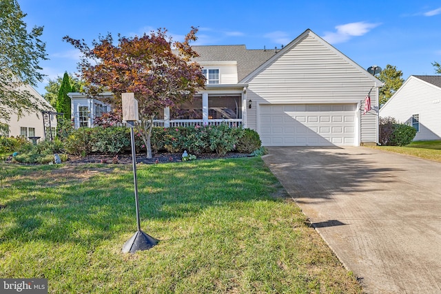 view of front facade featuring a garage and a front yard