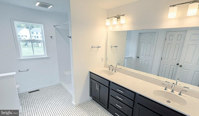 full bathroom featuring vanity, toilet, and washtub / shower combination