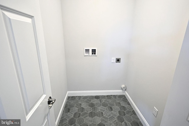 washroom with hookup for an electric dryer, washer hookup, and tile patterned floors