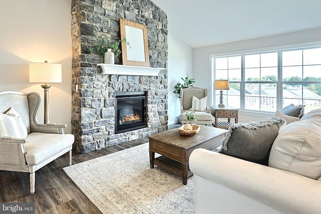 565 Bella May Cir, Lebanon, PA 17046 - living room with vaulted ceiling, wood finished floors, and a fireplace