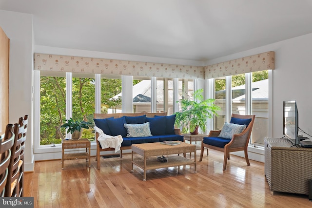 sunroom / solarium featuring plenty of natural light