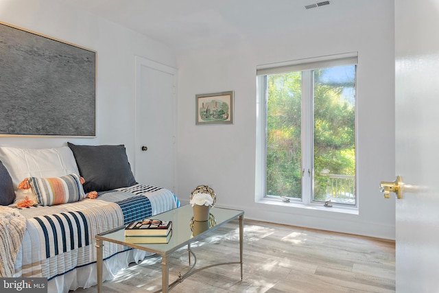 living room with light hardwood / wood-style floors