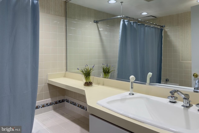 bathroom featuring vanity and walk in shower