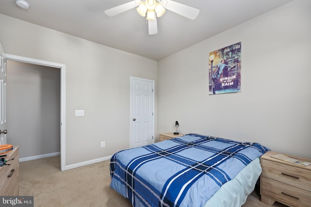 bedroom featuring ceiling fan and carpet floors