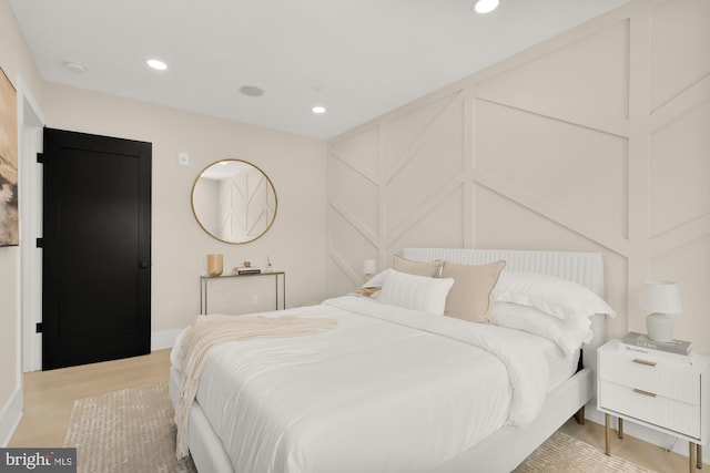 bedroom featuring light hardwood / wood-style floors