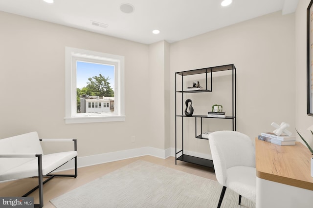 office space featuring light wood-type flooring