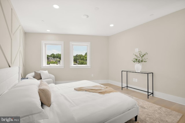 bedroom with light wood-type flooring