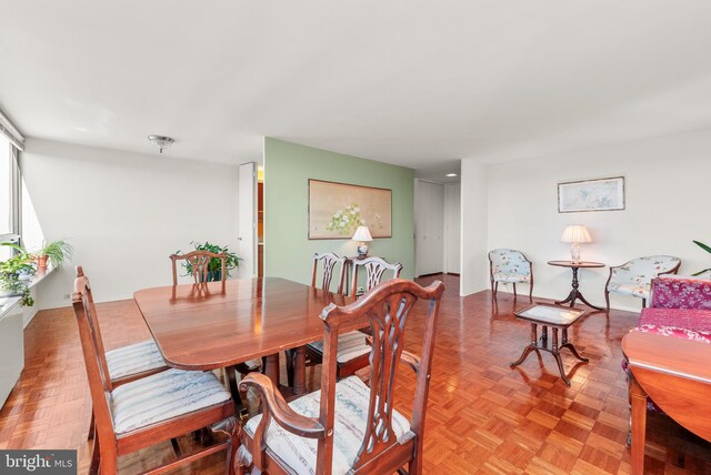 dining area with light parquet flooring