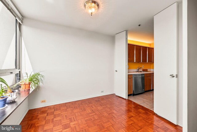 interior space with sink and light parquet flooring