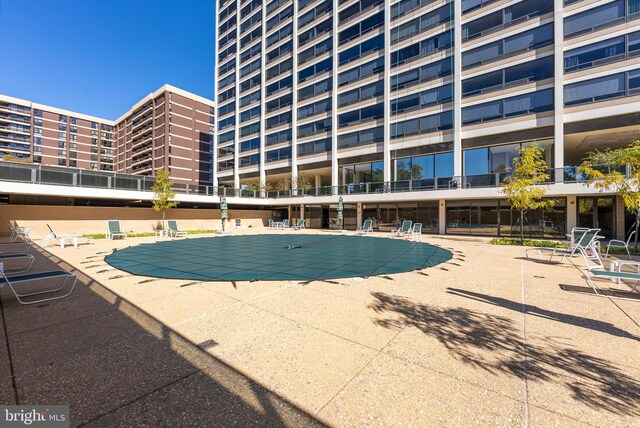 view of swimming pool featuring a patio