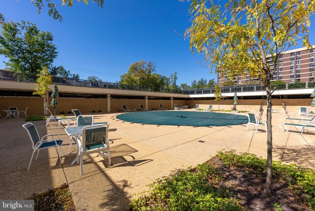 view of pool featuring a patio