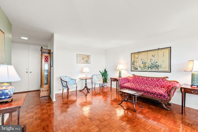 living room featuring parquet flooring