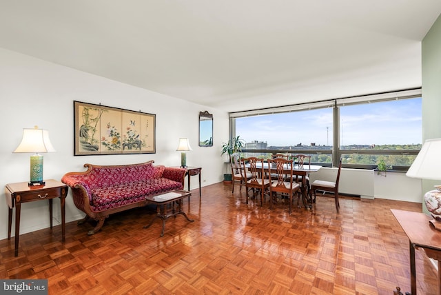 living room featuring parquet floors