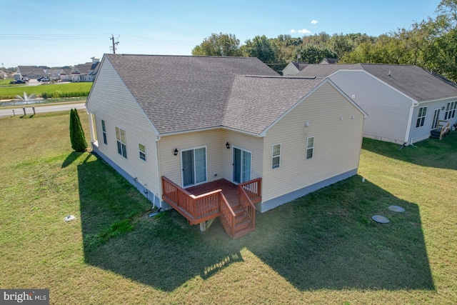 back of house with a yard