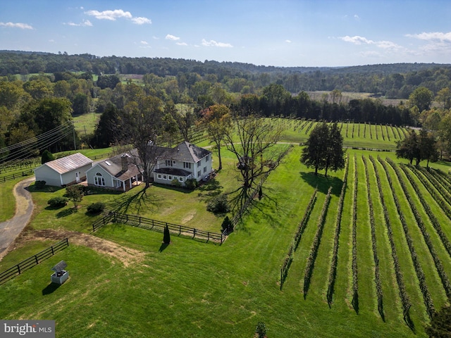 birds eye view of property featuring a rural view