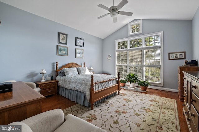 bedroom featuring ceiling fan, vaulted ceiling, and dark hardwood / wood-style flooring