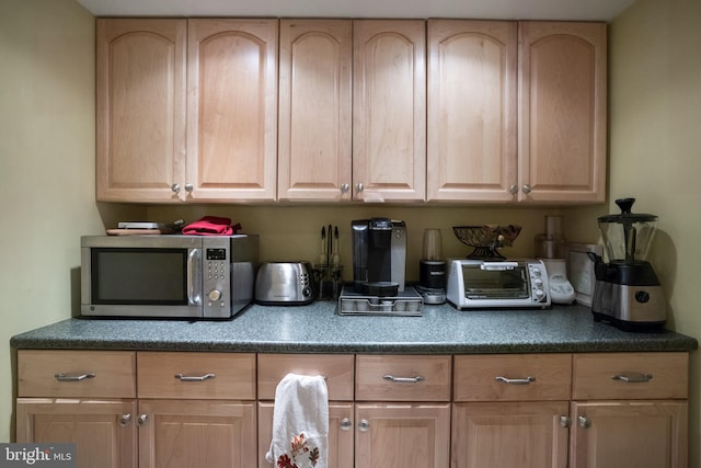 kitchen with light brown cabinetry