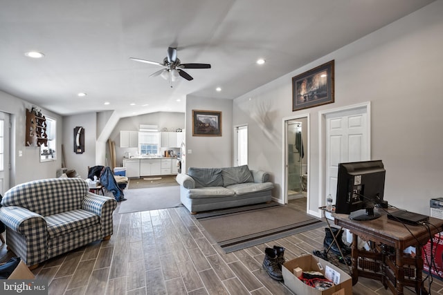 living room with ceiling fan, recessed lighting, wood finished floors, and baseboards