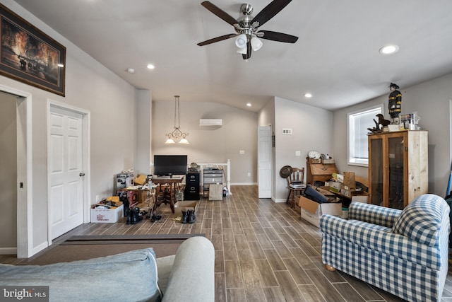 living room featuring lofted ceiling, ceiling fan, a wall mounted AC, and wood-type flooring