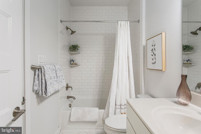 full bathroom with vanity, shower / bath combo with shower curtain, and toilet