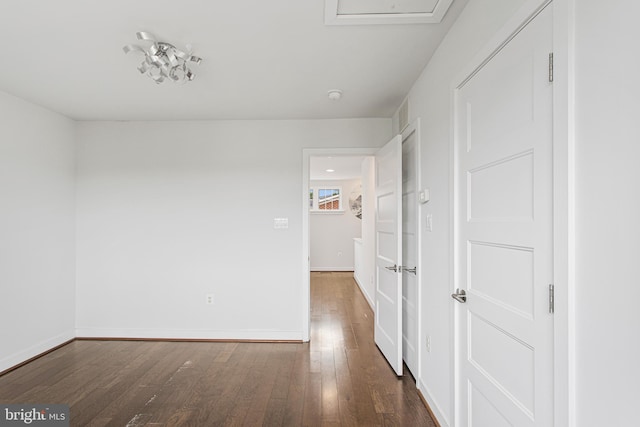 interior space with dark hardwood / wood-style flooring