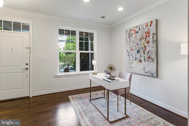 office area featuring dark wood-type flooring and crown molding