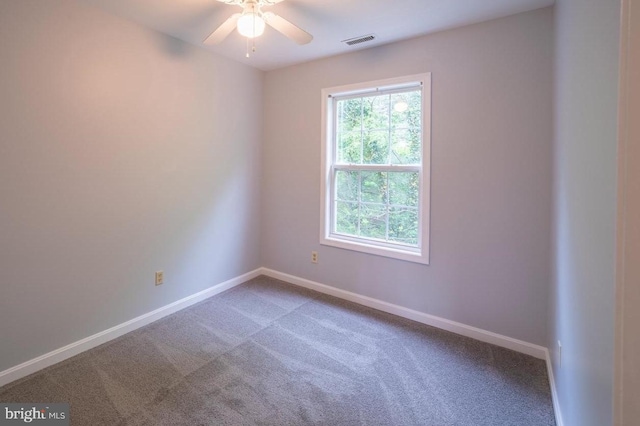 unfurnished room featuring carpet floors and ceiling fan