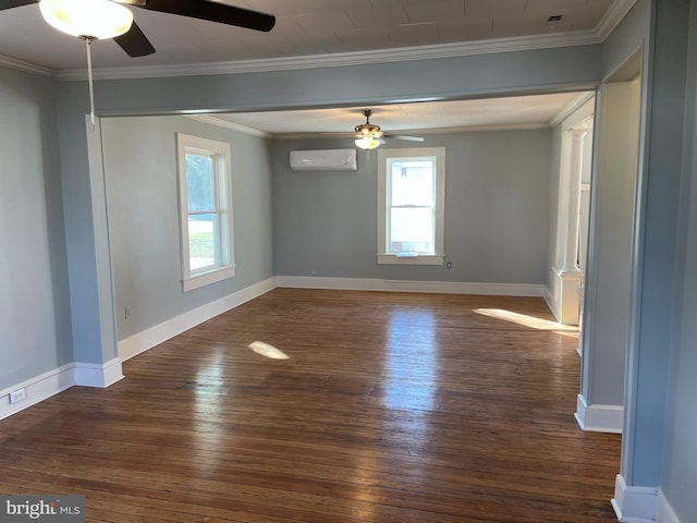 unfurnished room featuring a wall unit AC, ornamental molding, ceiling fan, and dark hardwood / wood-style flooring