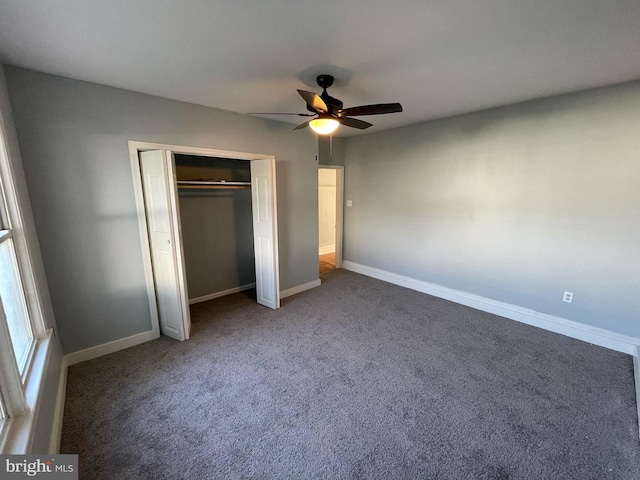 unfurnished bedroom with a closet, carpet floors, and ceiling fan