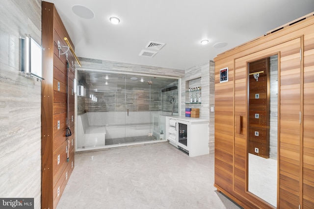 bathroom with wood walls