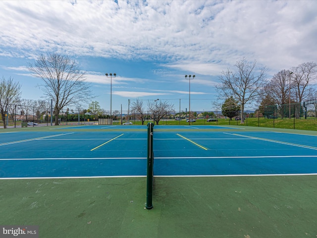 view of sport court featuring basketball hoop