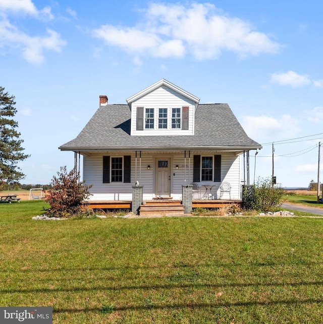 view of front of home with a front lawn and a porch