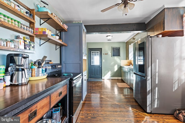 kitchen featuring beam ceiling, stainless steel appliances, dark hardwood / wood-style floors, and ceiling fan