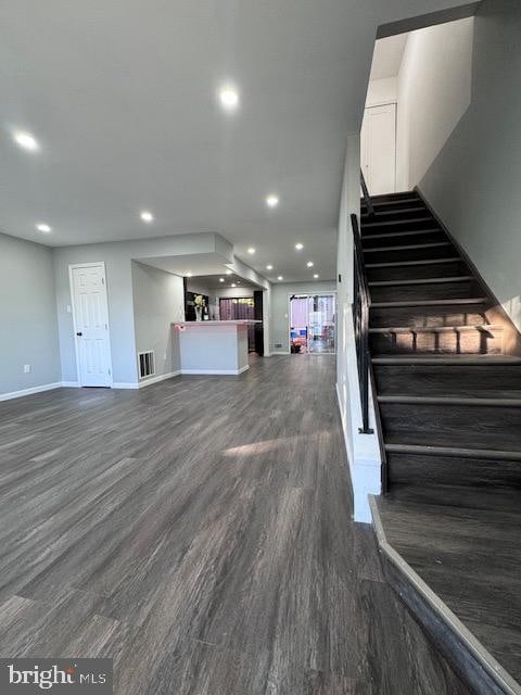 interior space with dark hardwood / wood-style floors