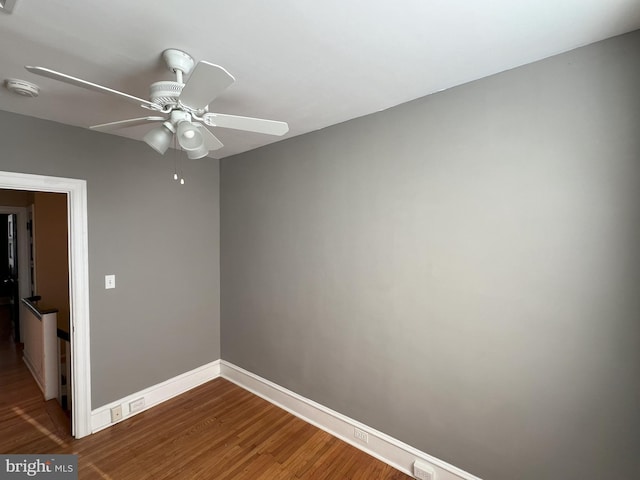 unfurnished room with hardwood / wood-style floors and ceiling fan