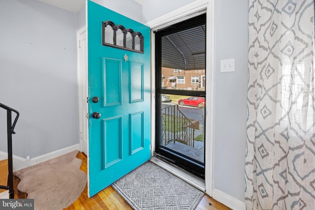 entrance foyer with light wood-type flooring